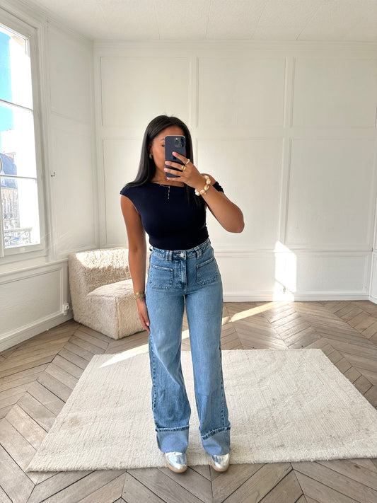 Jean délavée à poches et ourlets